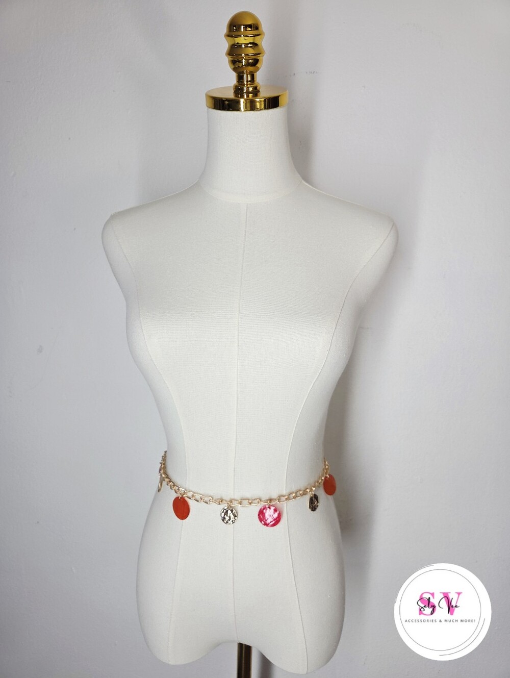 Gold chain belt with red and orange circular charms